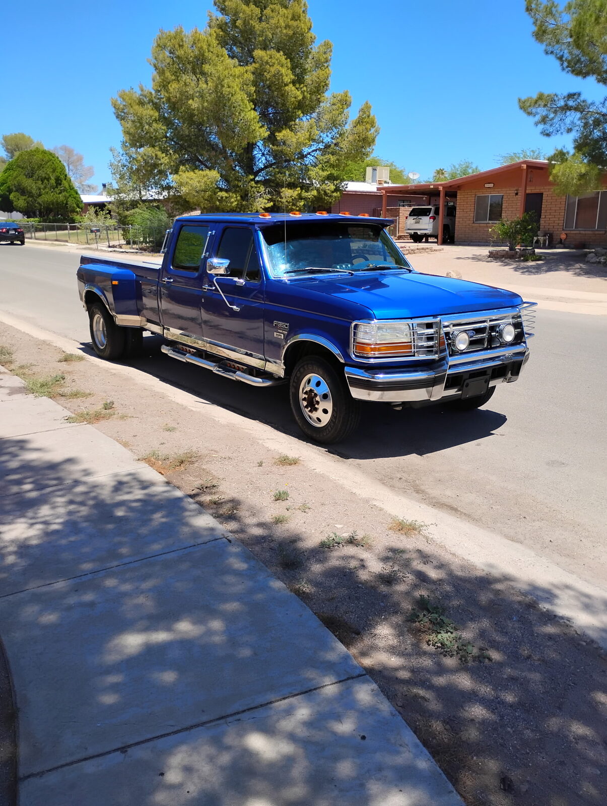Two-tone truck detailed in a Tucson parking lot